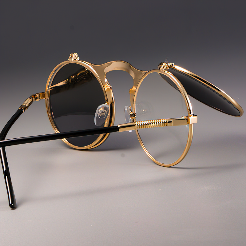Cool metal round sunglasses in gold with black temples, offering UV protection and stylish retro vibes for any outfit.