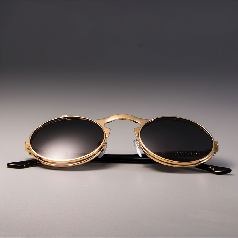 Cool metal round sunglasses for men and women, retro style with UV protection and unique black and gold design.