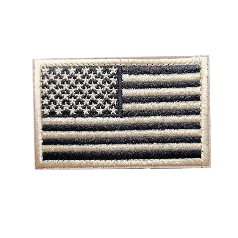 Vintage unisex military patch featuring a black and white embroidered American flag design.