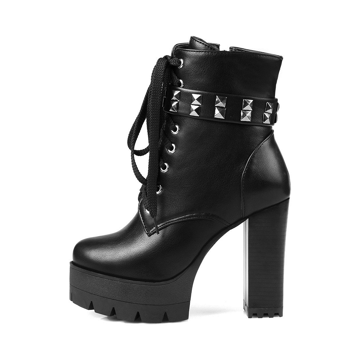 Stylish black high heel motorcycle boots with rivets and laces, ideal for a daring winter biker look.