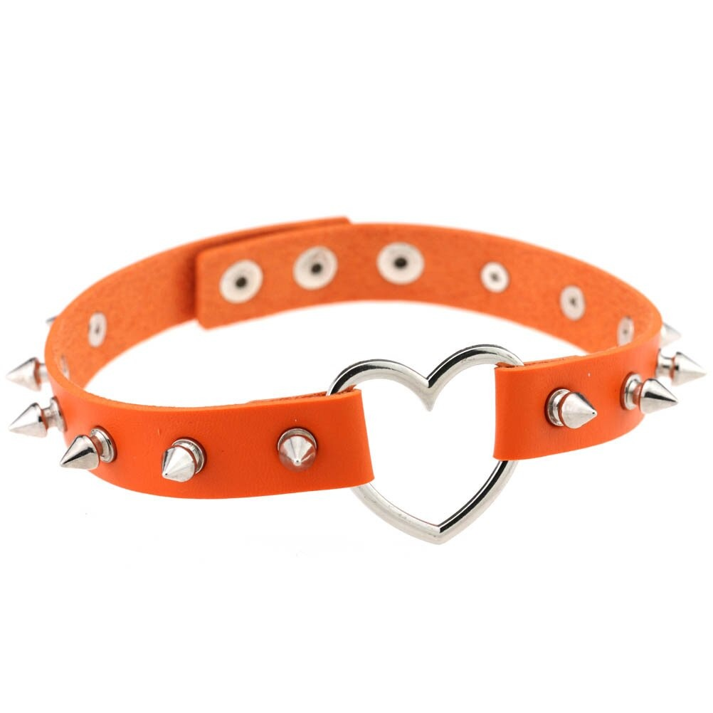 Cool orange PU leather choker with silver spikes and heart-shaped centerpiece for gothic and rock style outfits.
