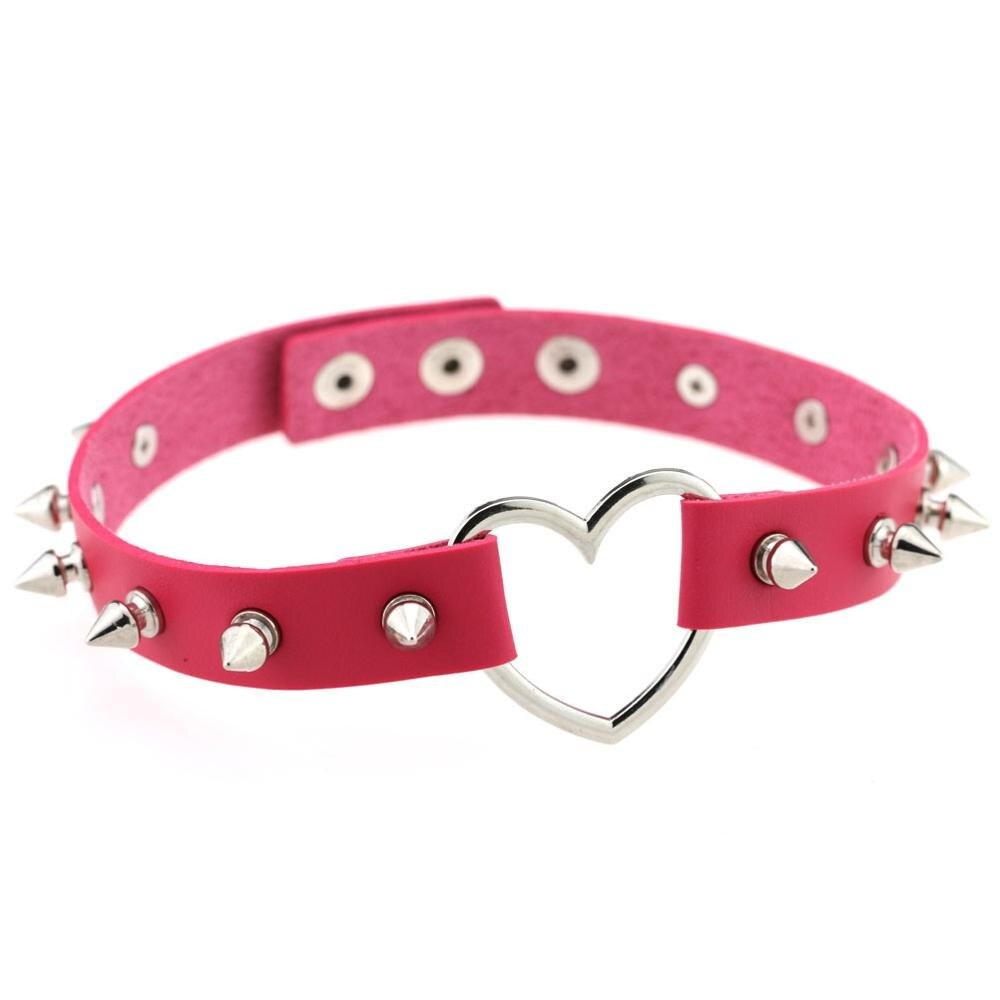 Cool pink PU leather choker with spikes and a zinc alloy heart, perfect for gothic and rock style outfits.