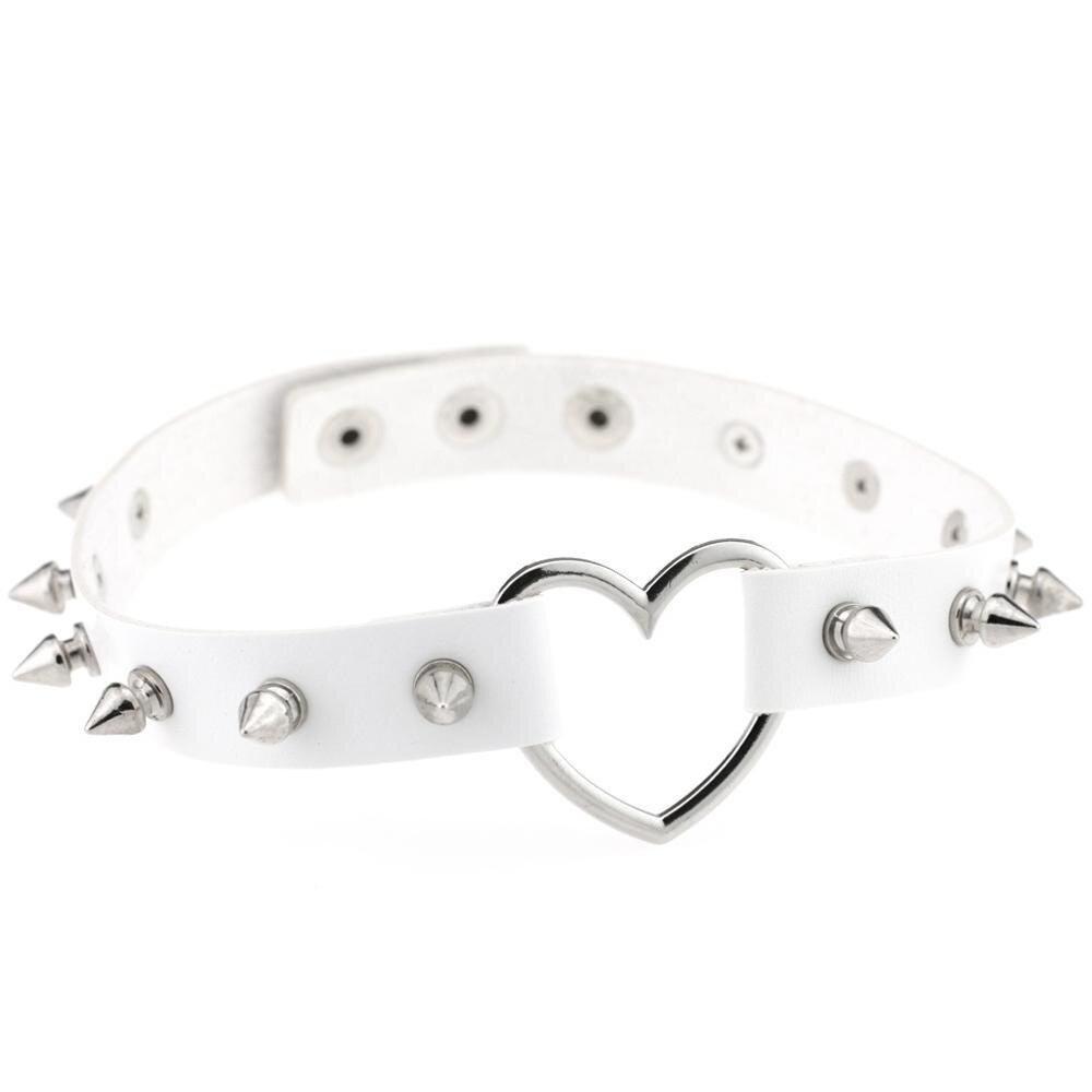 Cool white PU leather choker with spikes and a zinc alloy heart for gothic fashion enthusiasts.