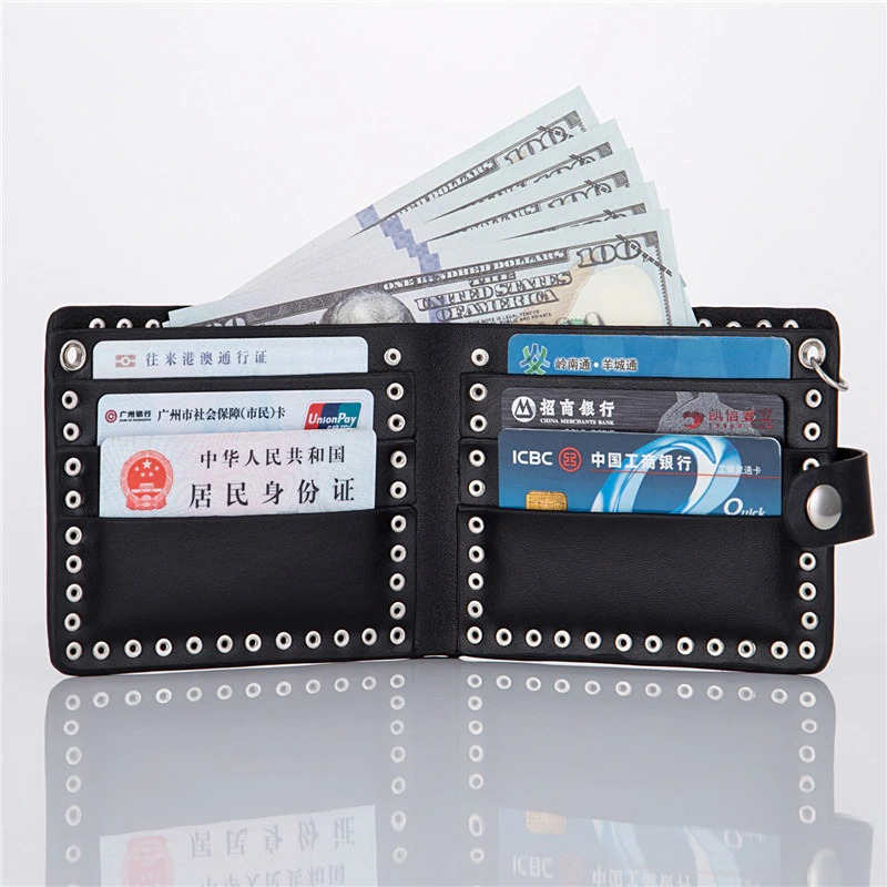 Unisex punk style wallet with chain, rivets, and cash, showcasing card slots and skull detail.