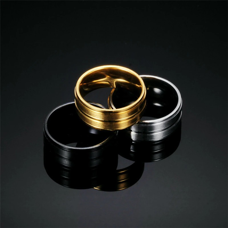 Cool stainless steel unisex rings in gold, silver, and black. Modern fashion jewelry for men and women.