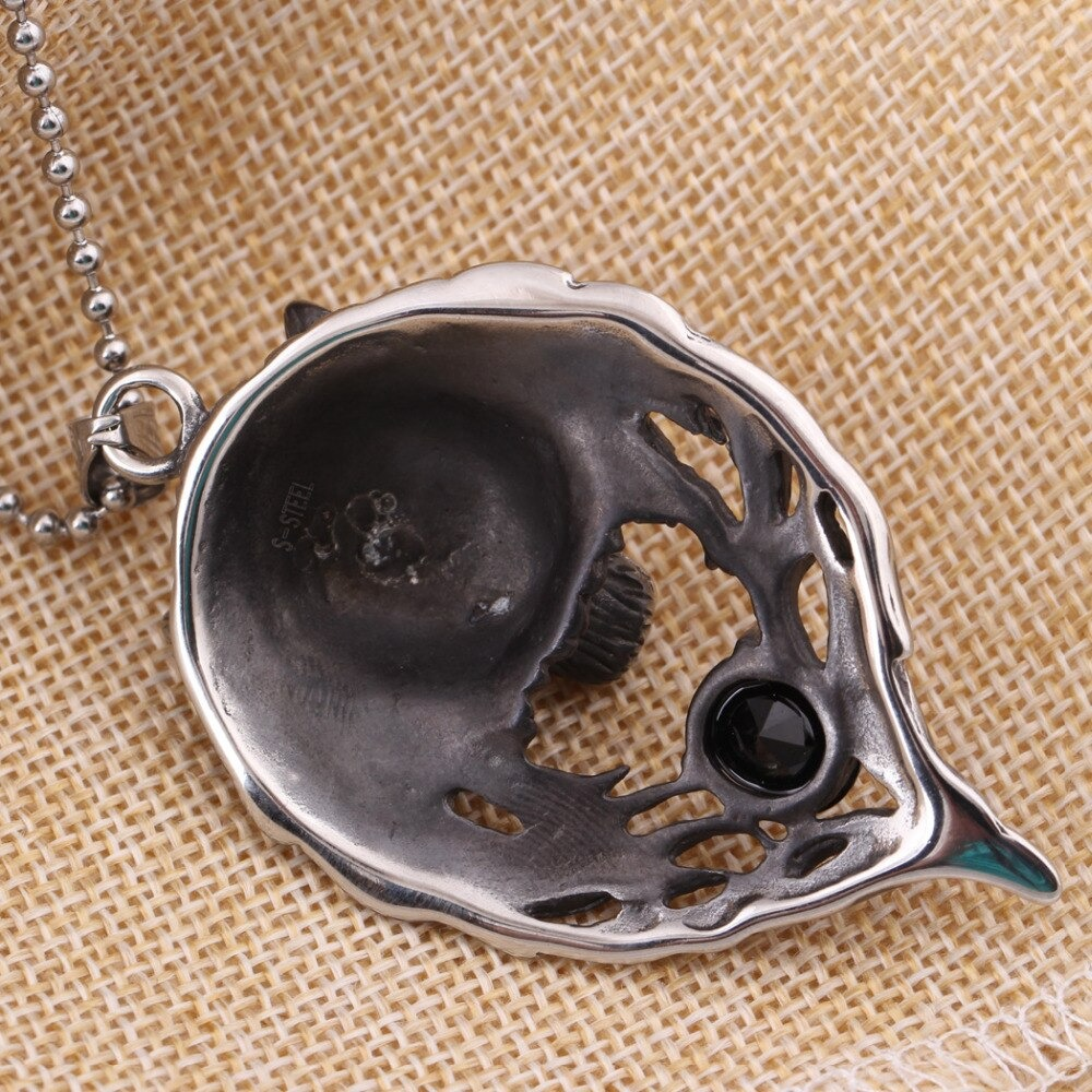 Cool stainless steel wolf's head pendant necklace with black crystal for punk style jewelry lovers.