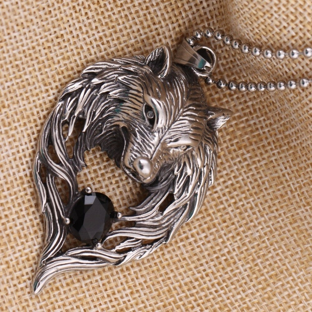 Cool stainless steel wolf's head pendant necklace with black crystal, perfect for punk and gothic style outfits.