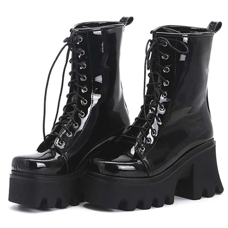 Stylish women's black gothic lace-up boots with thick platform heels made of shiny PU patent leather.