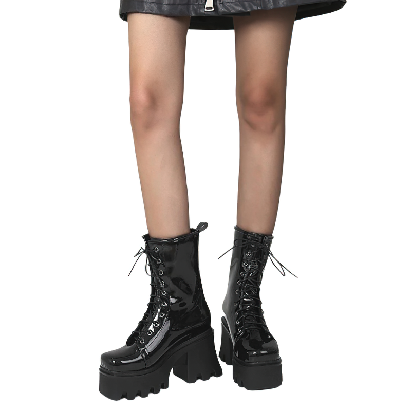 Stylish women's black patent leather gothic lace-up boots with thick platform heel, perfect for casual wear.