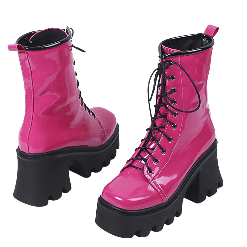 Pink patent leather gothic boots with lace-up design and thick tractor heels for women.