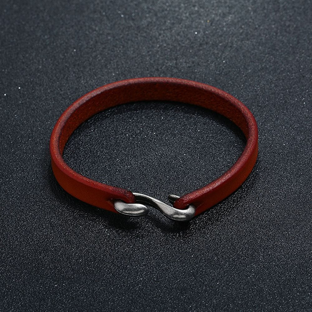 Stylish unisex genuine leather narrow bracelet in red with silver clasp, ideal for casual rock style outfits.