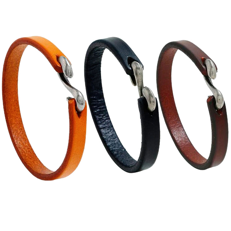 Three unisex genuine leather narrow bracelets in orange, black, and burgundy with stylish clasps for a rock-inspired look.