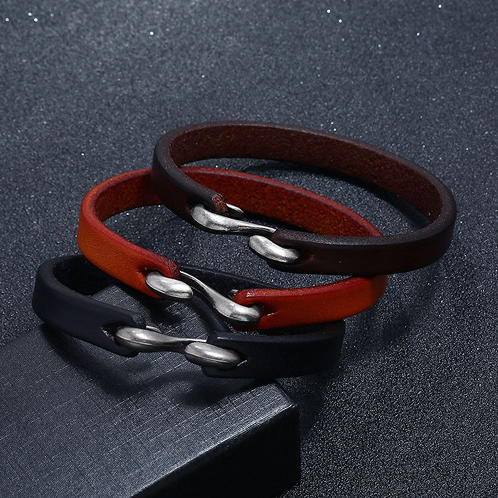 Cool unisex genuine leather narrow bracelets in black, red, and brown with stylish metal accents.