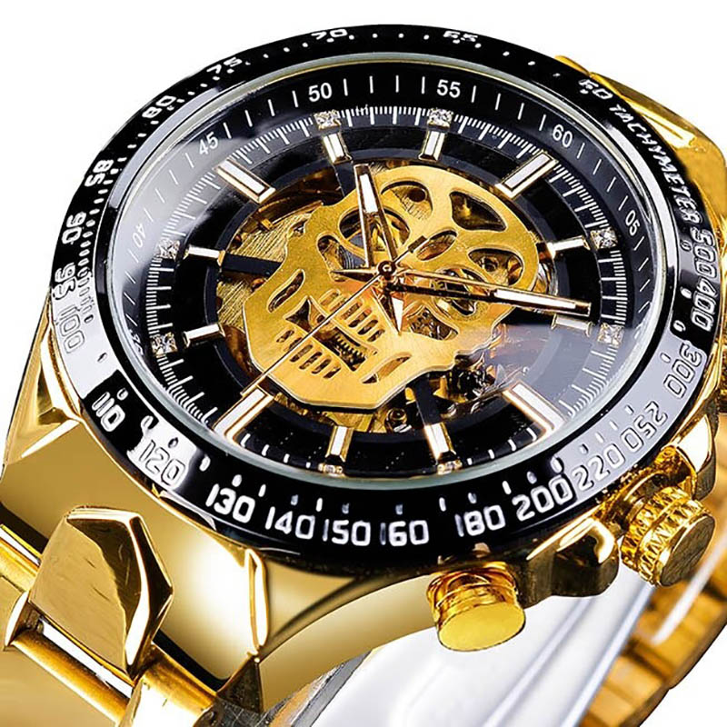 Unisex Gothic mechanical watch with luminous hands and skull design, gold stainless steel wristwatch for rock style lovers.
