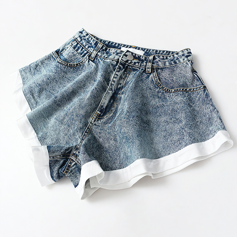 Cool women's denim mini shorts with ruffle hem, high waist design and pockets for stylish summer outfits.