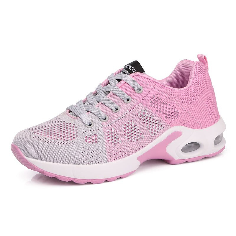 Cool women's lace-up sneakers in pink and grey, perfect for a stylish and trendy look.