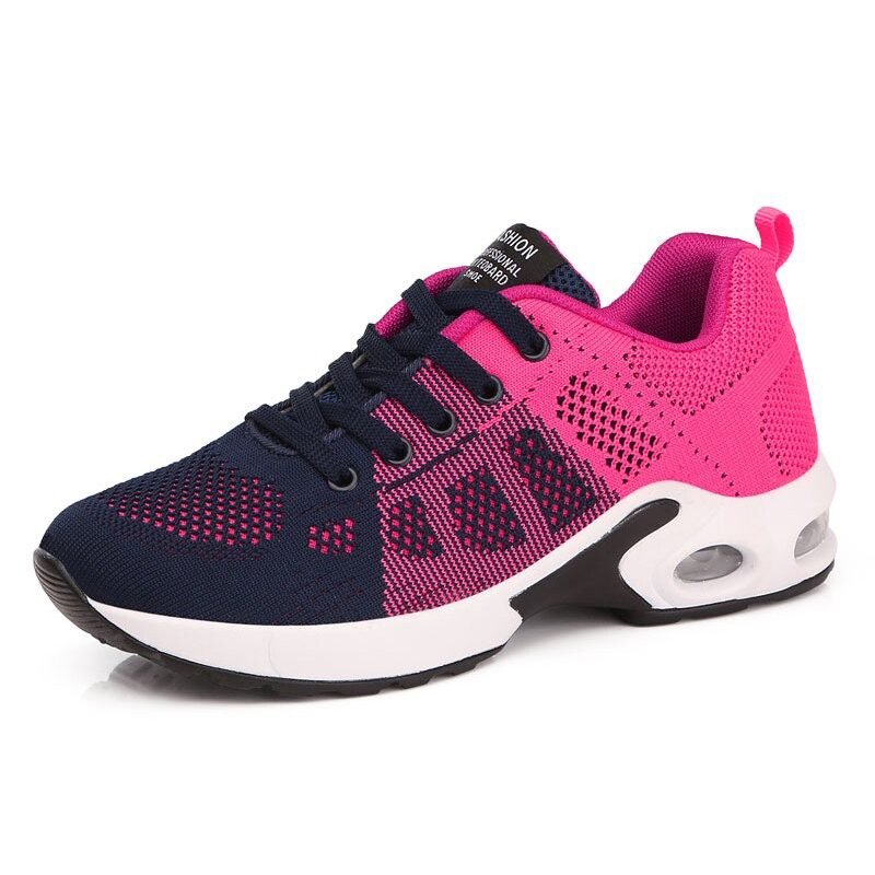 Trendy women's lace-up sneakers in navy and pink mesh, perfect for stylish and comfortable everyday wear.