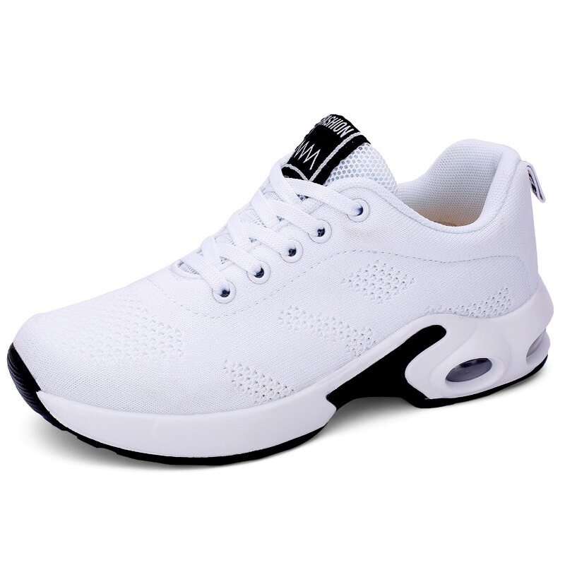 Stylish white women's lace-up sneakers with air mesh design, perfect for trendy and comfortable outfits.