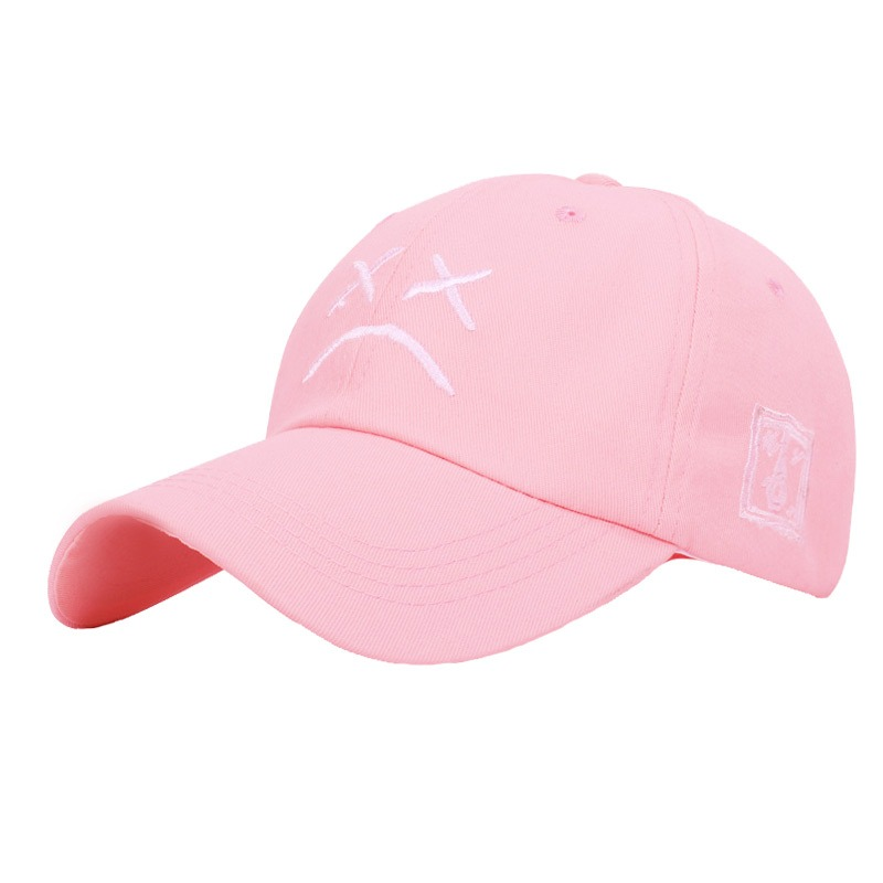 Pink cotton baseball cap with crying face print, perfect for casual style on hot days for both men and women.