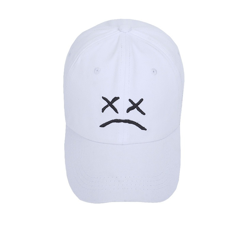Cotton baseball cap for men and women featuring a crying face print in black on a white background.