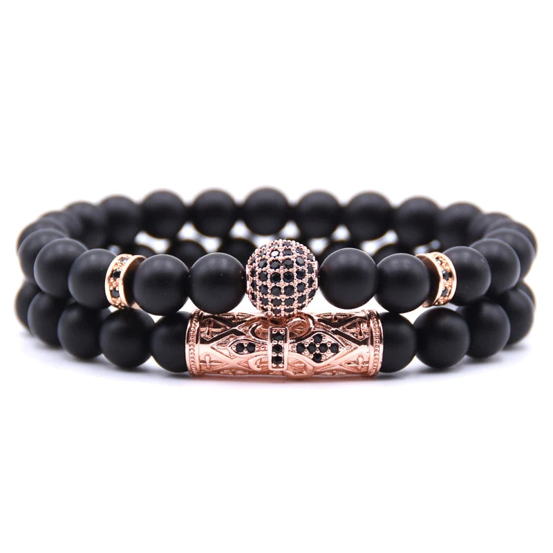 Unisex punk style couple round bracelets with black beads and decorative gold ball. Trendy jewelry for men and women.
