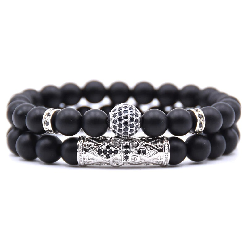 Couple round punk style bracelets with black beads and silver ball accents for unisex jewelry.