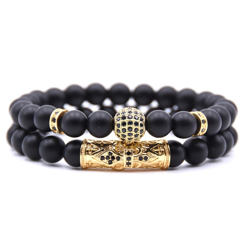 Trendy black couple round bracelets featuring gold accents and punk style design, perfect unisex jewelry accessory.