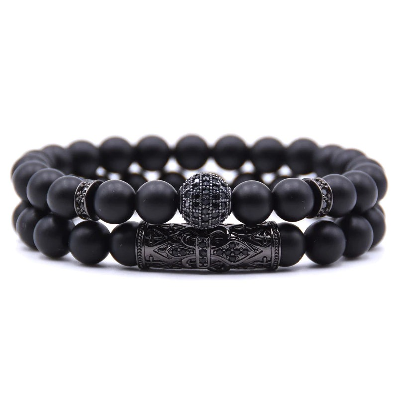 Couple round bracelets in punk style with black beads and decorative ball, trendy unisex jewelry accessory.