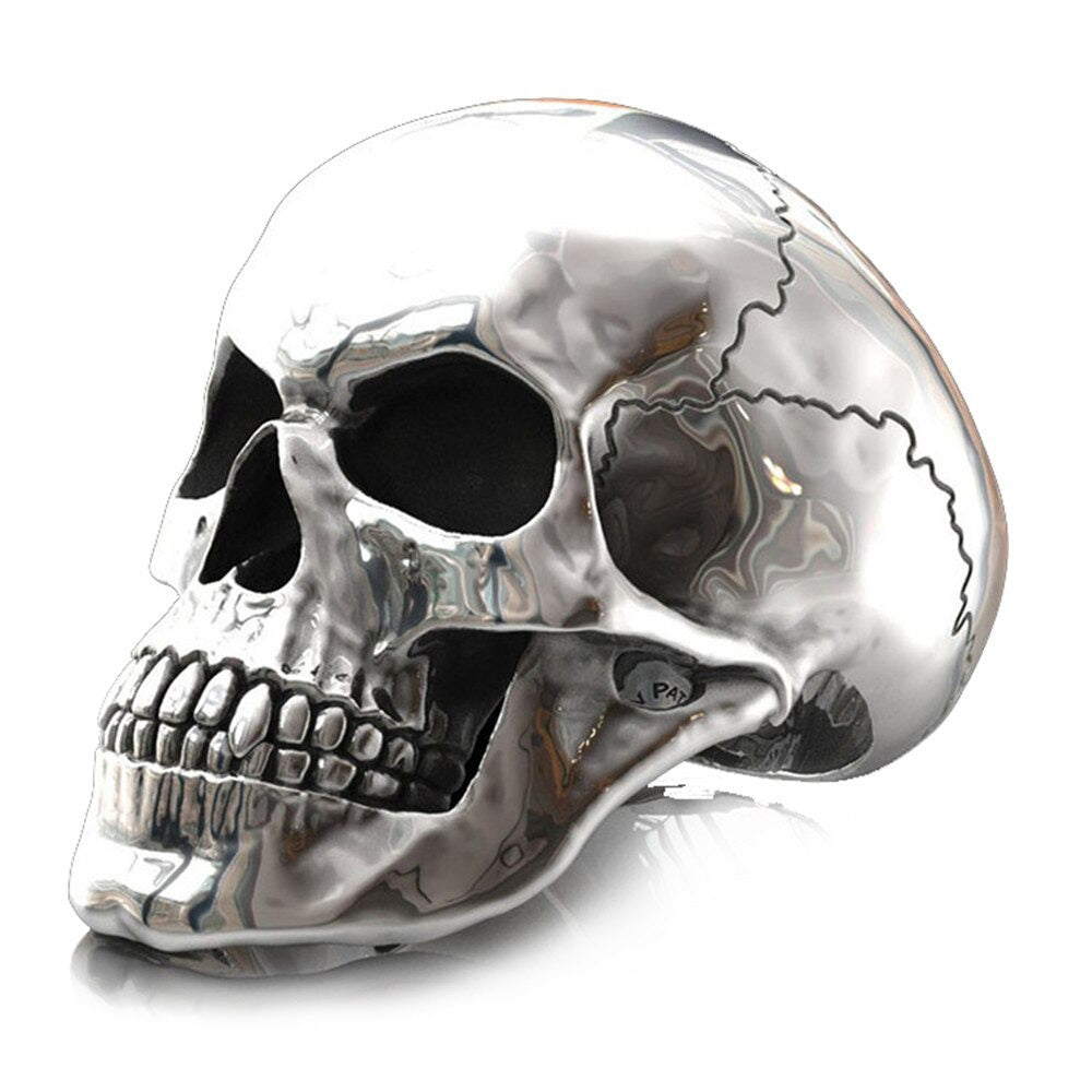 Shiny metal skull ring, perfect gothic accessory for men and women, complements rock style outfits.