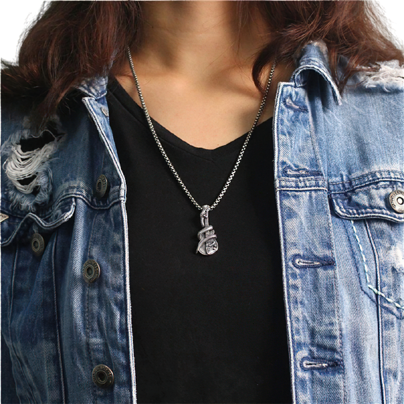 Unisex pure silver guitar pendant with snake design worn on a model, showcasing rock style jewelry.