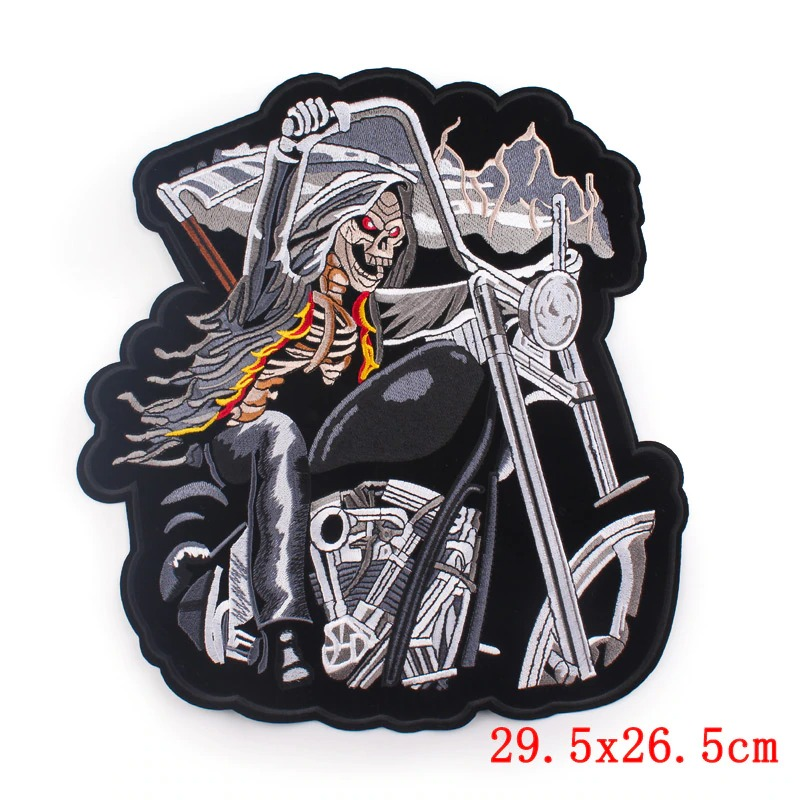 Creepy skull skeleton riding a motorcycle embroidered iron-on patch for jackets and bags, perfect for bikers.