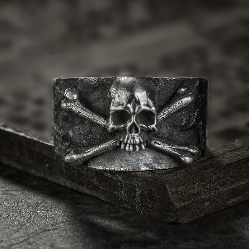 Silver color pirate ring featuring a skull and crossbones design, perfect for punk and rock style enthusiasts.