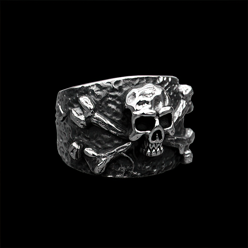 Silver color pirate ring featuring a skull and bones design, ideal for punk and rock style outfits.