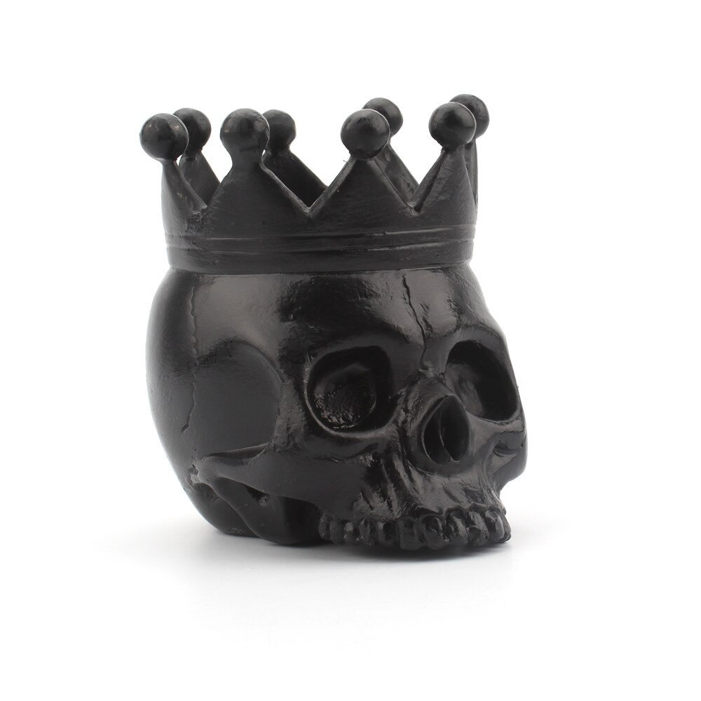 Black crown skull candle holder, gothic decorative stand for home decor, unique skeleton sculpture.