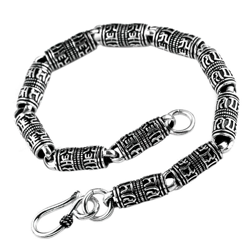 Cylindrical bracelet in 925 silver featuring carved ethnic symbols, perfect for men and women.
