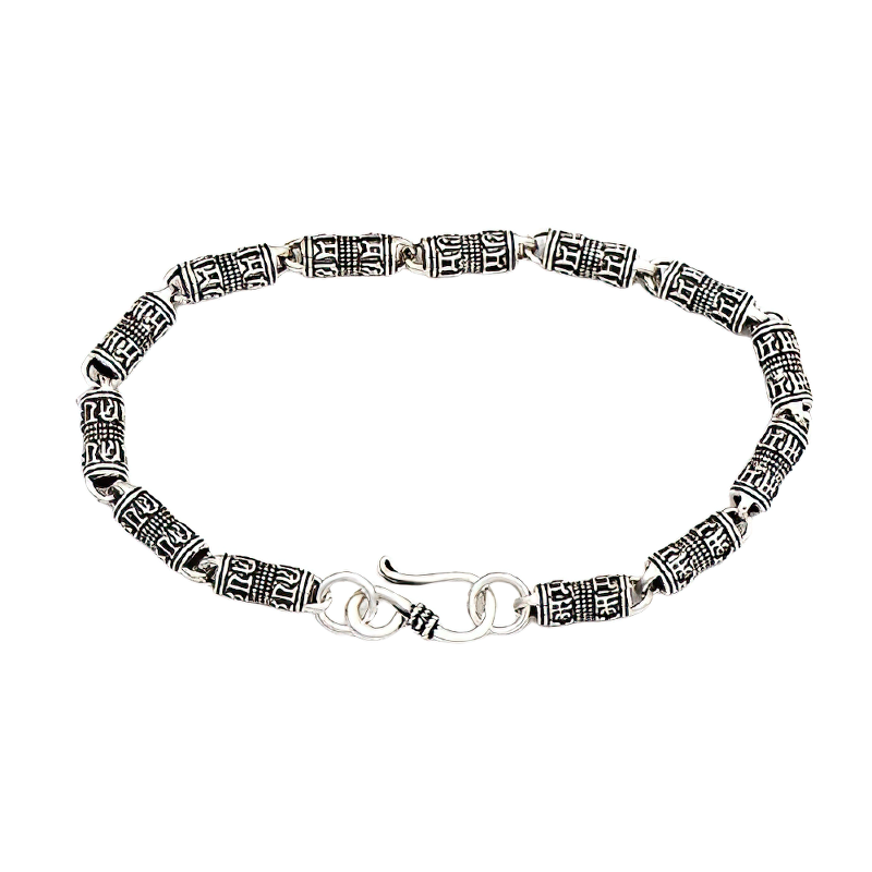 Cylindrical silver bracelet with ethnic carvings, unisex jewelry chain for unique style and elegance.