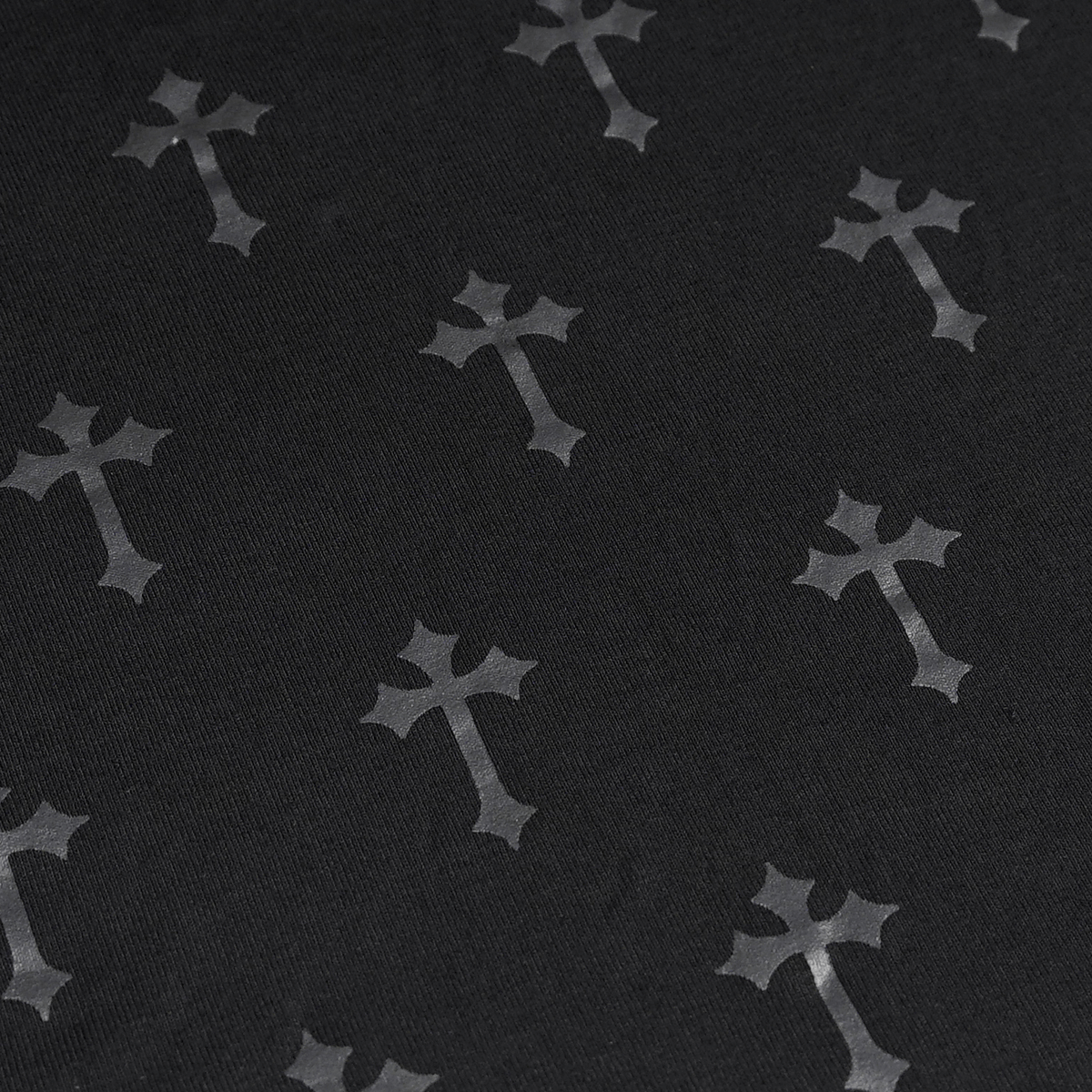 Black fabric featuring a trendy pattern of silver crosses, perfect for punk-style fashion.