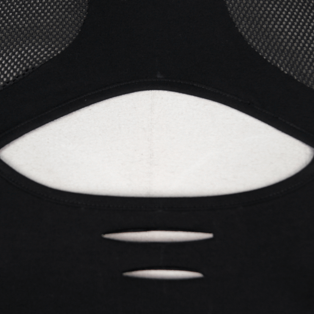 Close-up of a dark grunge black T-shirt featuring a hollow-out design and mesh elements for a gothic aesthetic.