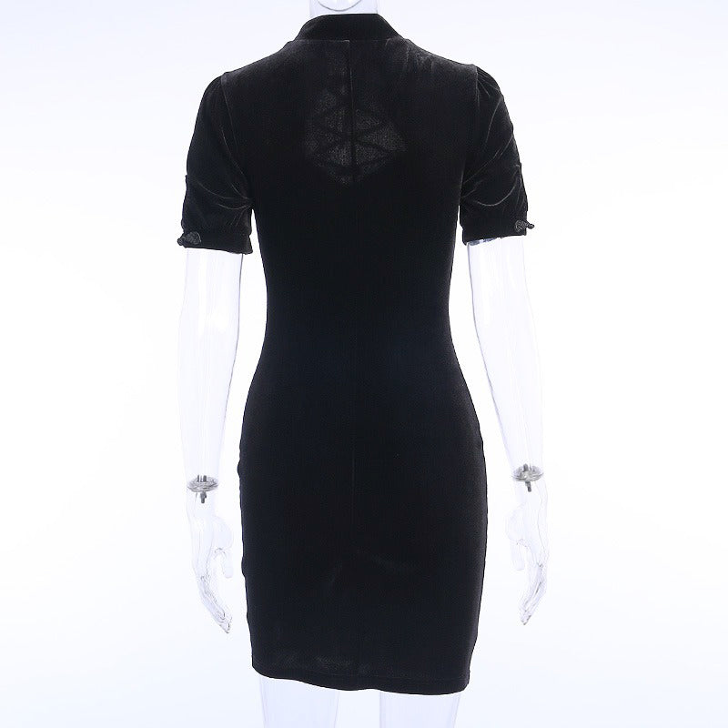 Back view of a short sleeve black gothic dress with lace-up neckline and unique design.