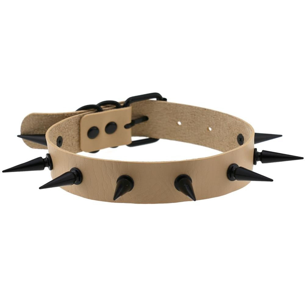 Dark Witch's spiked choker collar in beige, featuring black iron spikes, perfect for gothic and rock outfits.