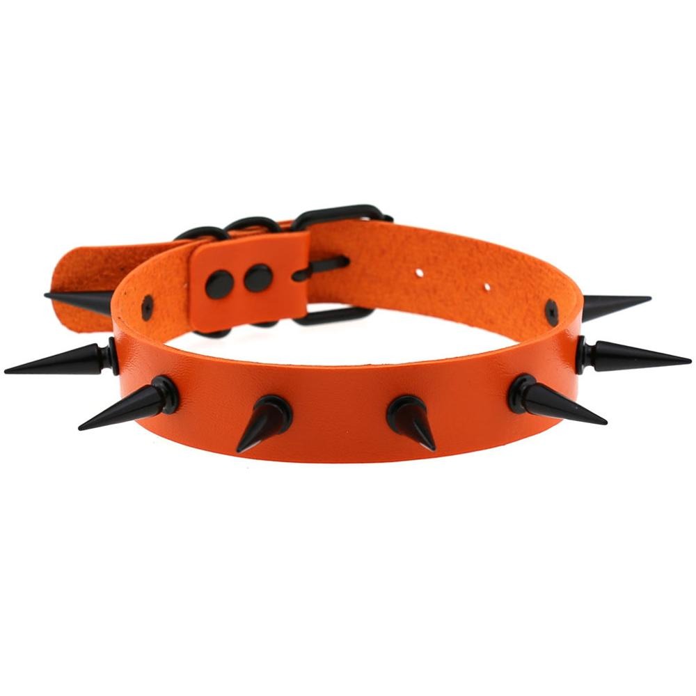 Dark witch's spiked choker collar in vibrant orange, featuring black spikes and adjustable design for gothic style outfits.