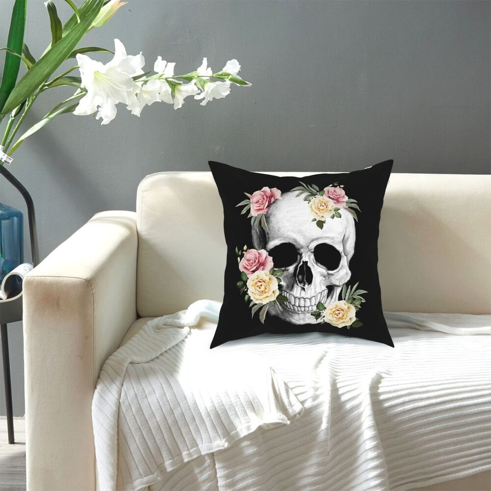 Decorative black pillowcase featuring a skull and roses print, perfect for gothic home decor.