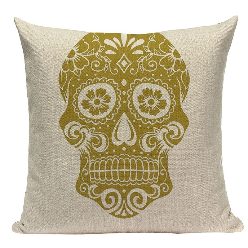 Decorative pillowcase featuring a stylish gold skull print on linen with hidden zipper for unique room decor.