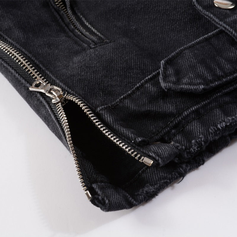 Close-up of denim zipper on men's punk jacket, showcasing trendy metal rivets and stylish pockets, perfect for streetwear.