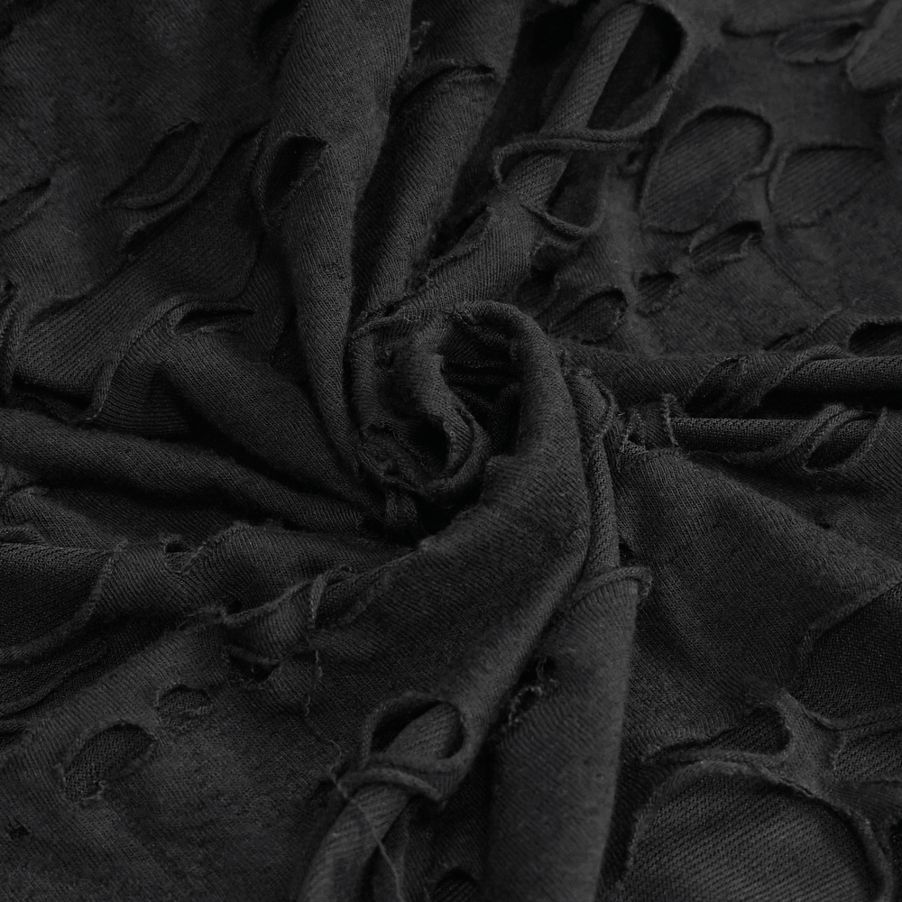 Detail of black ripped fabric showcasing the edgy design of a gothic long sleeve hoodie.