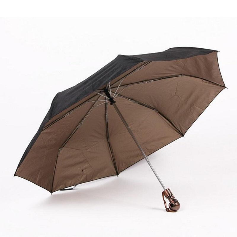 Devil Skull Handle Umbrella opened, stylish black and brown design, perfect for sun and rain protection.