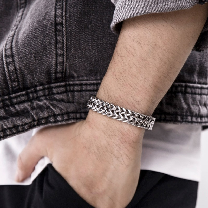 Stylish double side chain bracelet on wrist, perfect for rock outfits and alternative fashion, made of durable stainless steel.