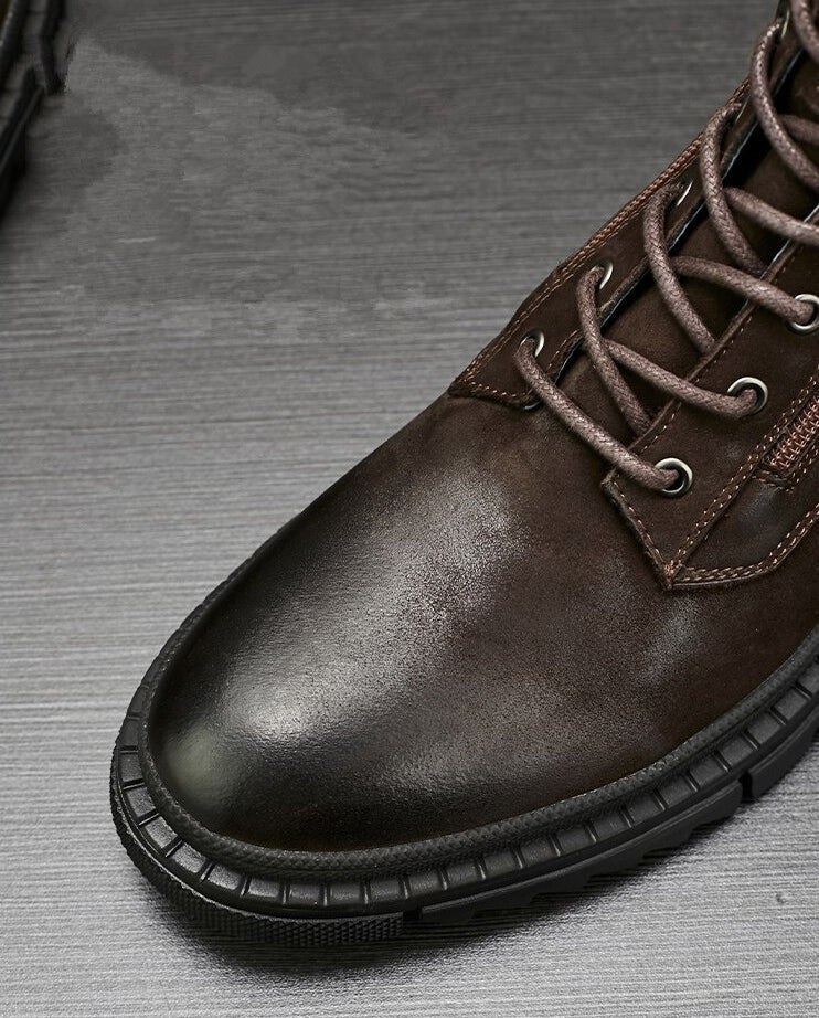 Stylish men's retro leather motorcycle boots with lace-up design and flexible soles in dark brown color.