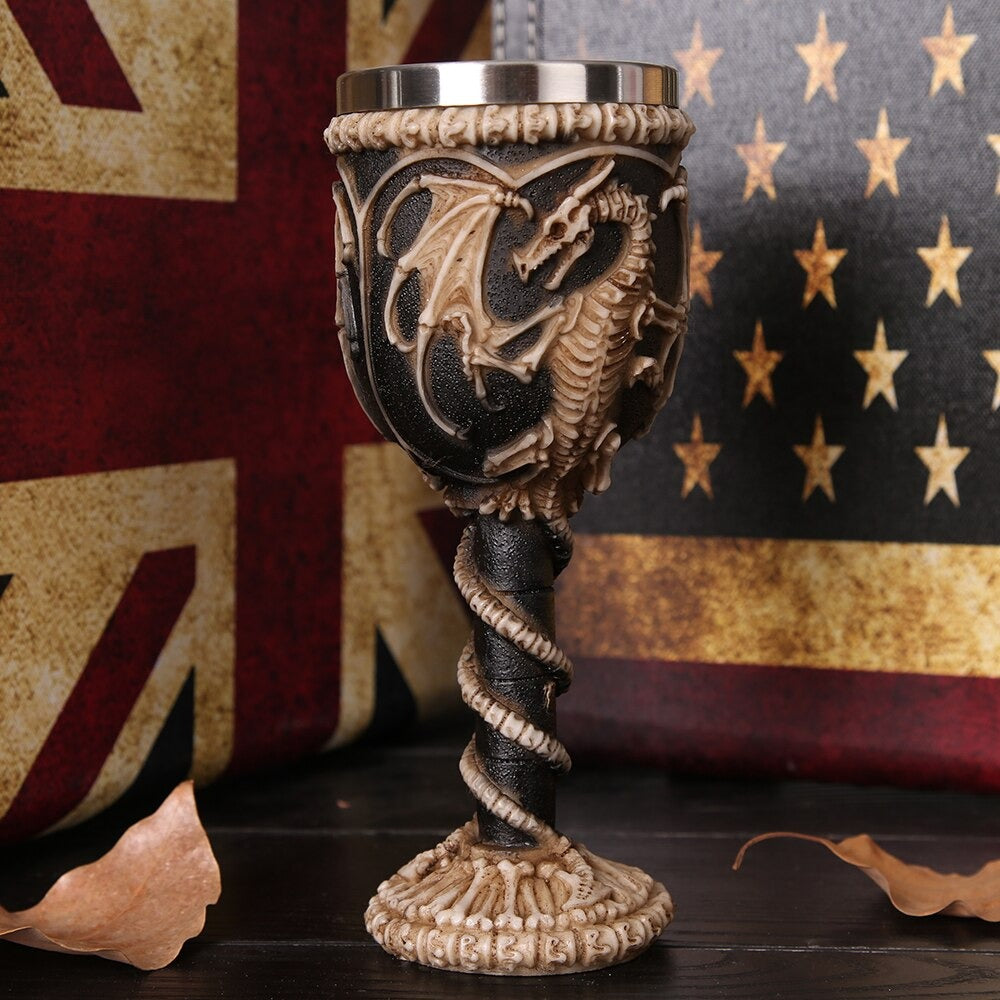 Dragon Bone stainless steel wine glass with dragon design, retro style drinkware against vintage background.