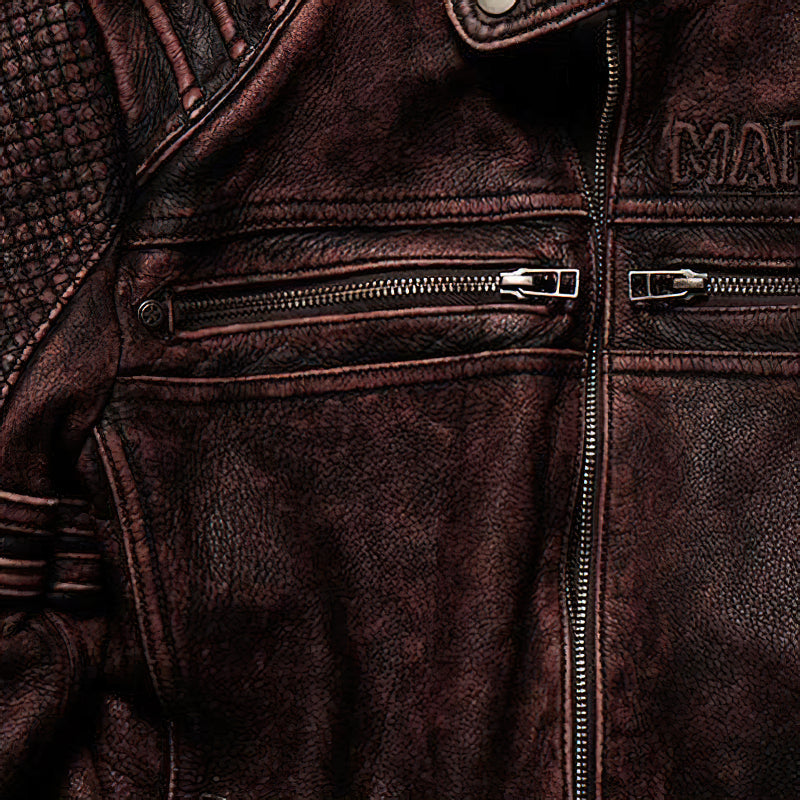 Stylish brown biker jacket featuring zippers and textured fabric, perfect for vintage motorcycle fashion.